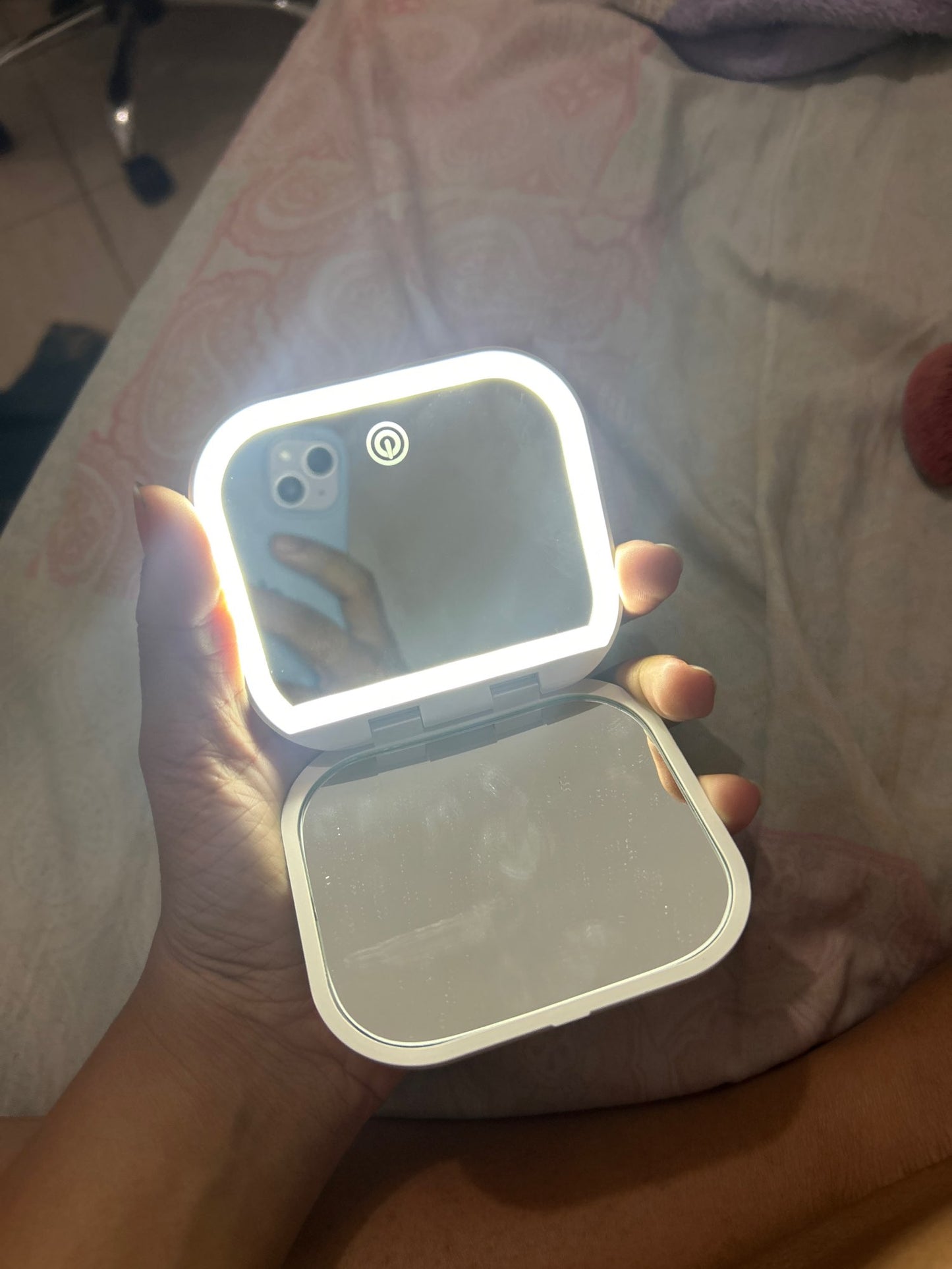 Small mirror with lights