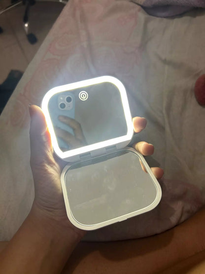 Small mirror with lights