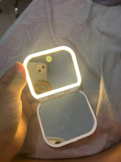 Small mirror with lights