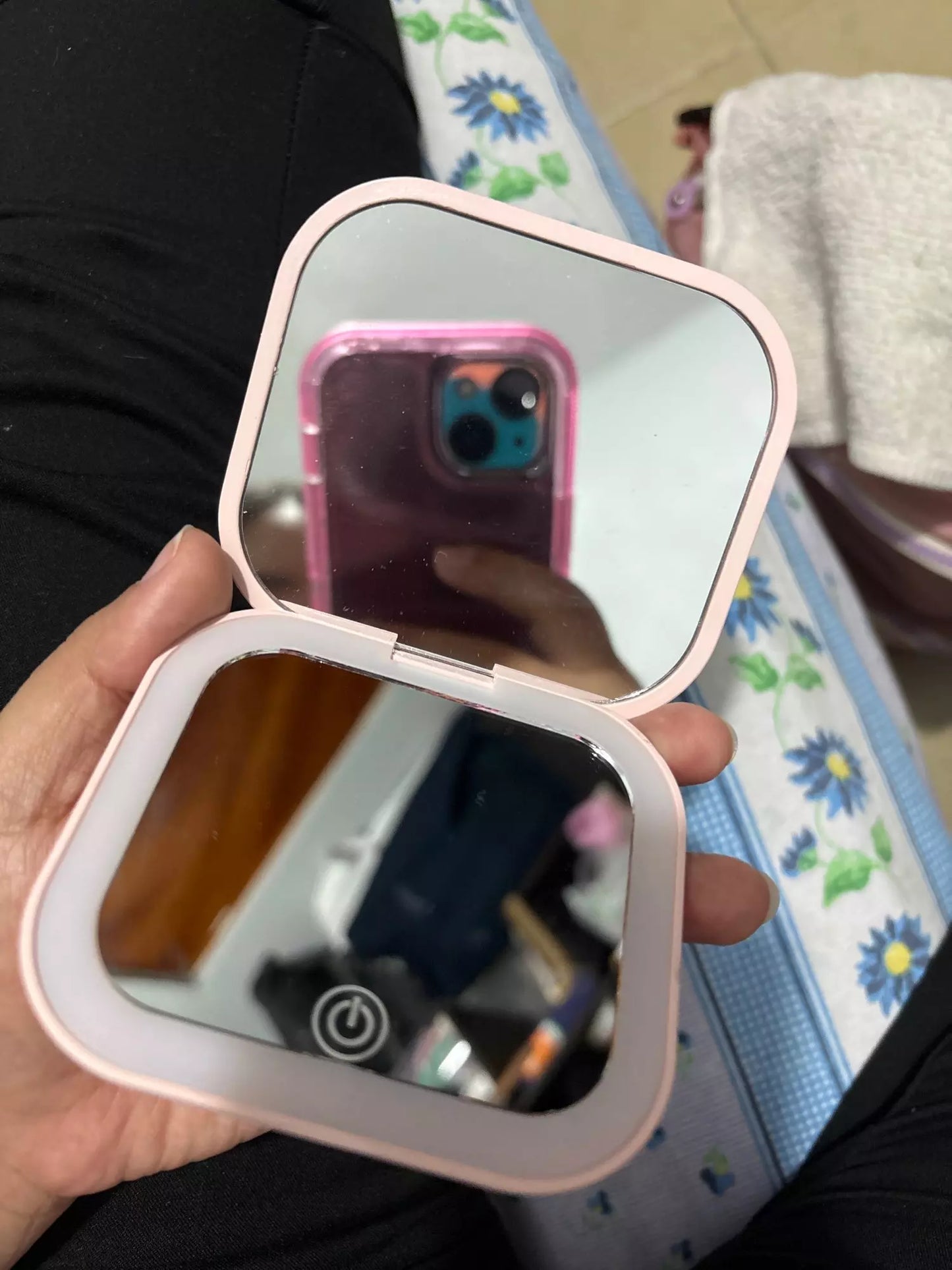 Small mirror with lights