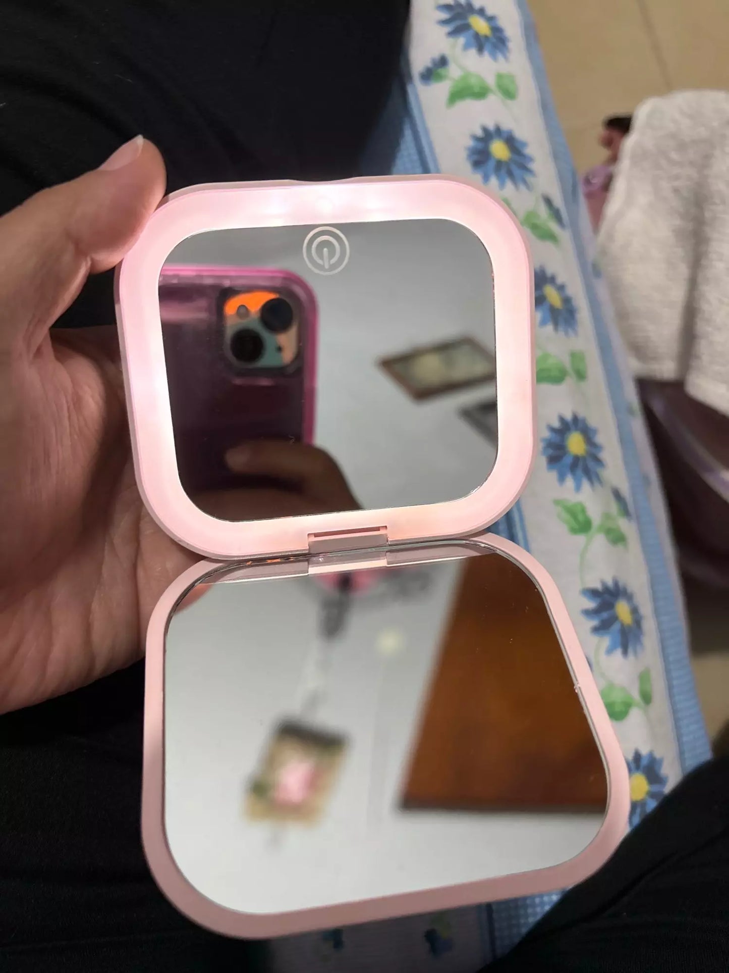 Small mirror with lights