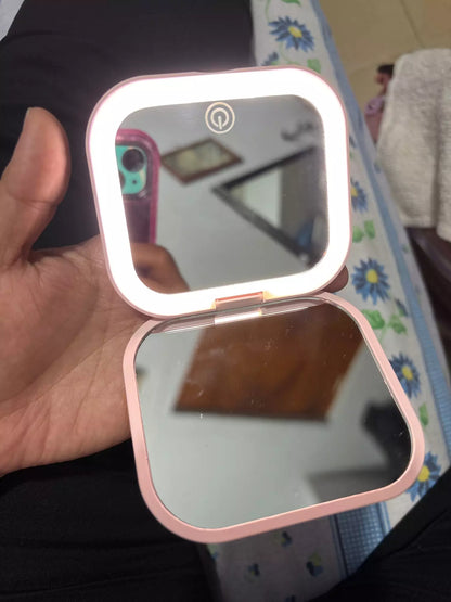 Small mirror with lights