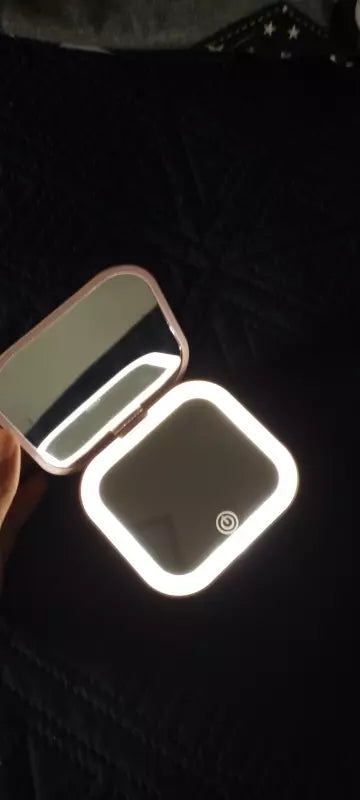 Small mirror with lights