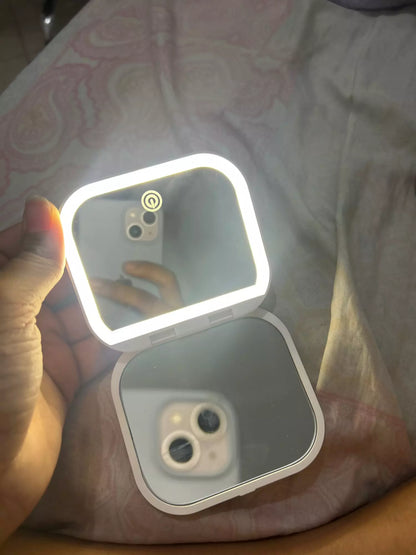 Small mirror with lights