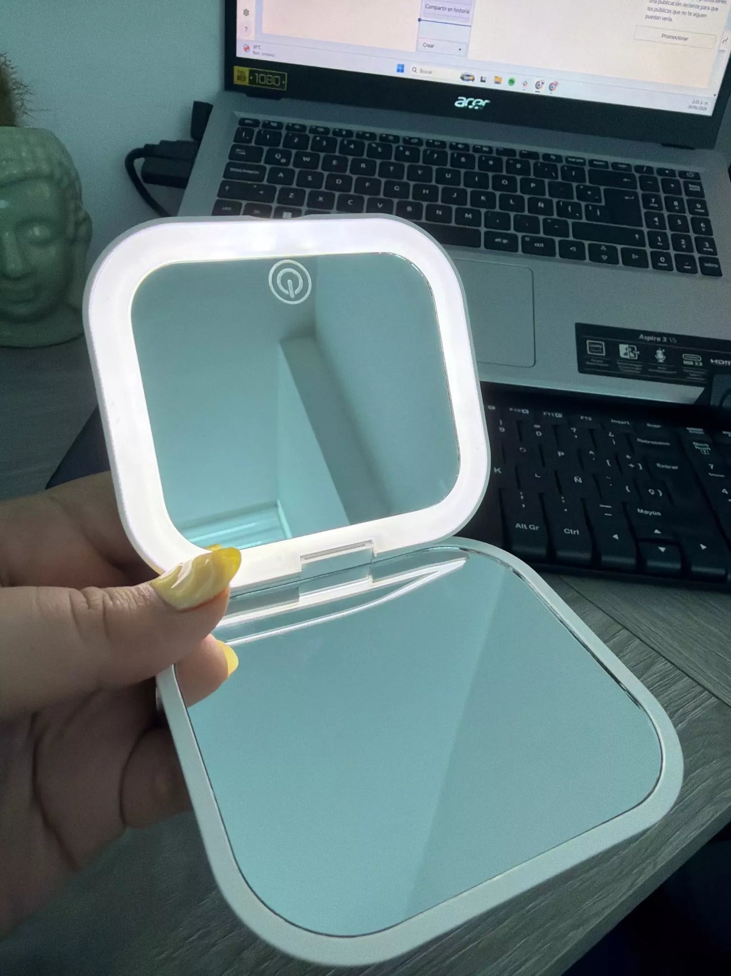 Small mirror with lights